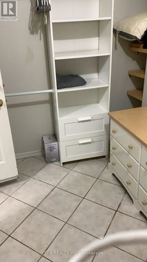 Toronto (Oakwood Village) apartment for rent - A white closet with a white door and a white trash can.
