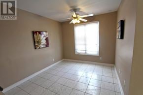 Vaughan (Crestwood-Springfarm-Yorkhill) townhouse for rent - A room with a ceiling fan and a window with blinds.