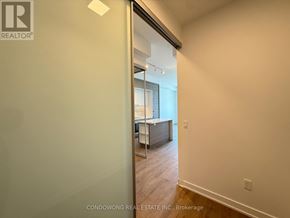 Toronto (Bayview Village) condo for rent - A room with a sliding glass door leading to a balcony.