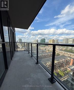 Toronto (South Parkdale) condo for rent - A balcony with a view of the cityscape.