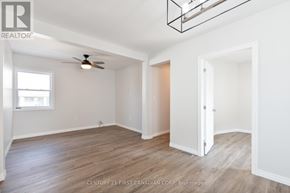 St. Thomas multi-family for rent - A room with a ceiling fan and a window.