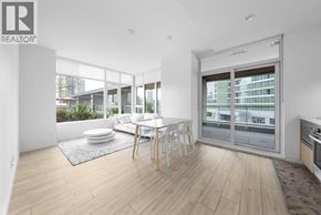 Burnaby apartment for rent - A modern living room with a dining table and chairs.