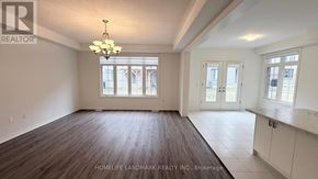Springwater (Midhurst) apartment for rent - A large, empty room with wooden floors and white walls.
