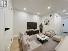 Hamilton apartment for rent - A living room with a flat screen TV and a coffee table.