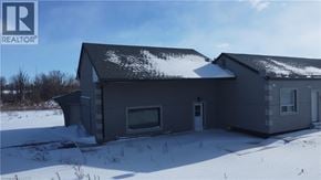 Hamilton apartment for rent - A house with snow on the roof and ground.