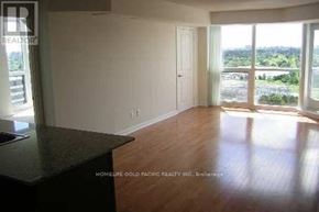 Toronto (Newtonbrook East) condo for rent - A room with a black countertop and a view of the outdoors through the windows.
