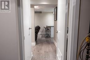 Vaughan (Vellore Village) apartment for rent - A hallway with a door on the left and a door on the right.