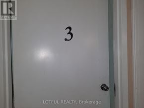 Edwardsburgh/Cardinal apartment for rent - A white door with the number 3 on it.