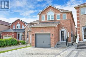 Markham (Middlefield) apartment for rent - A red brick house with a grey garage door is for sale.