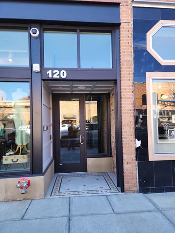 Bozeman apartment for rent - The front of a building with the number 120 on it.