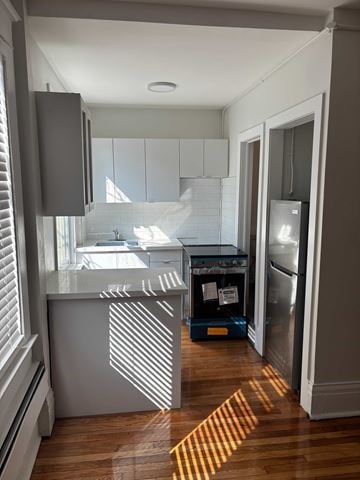 Toronto apartment for rent - A kitchen with a refrigerator and a dishwasher.