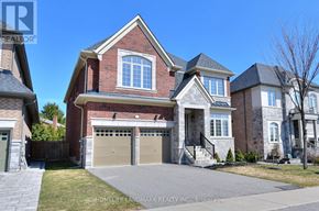 Newmarket (Glenway Estates) apartment for rent - A large brick house with a garage is for sale.