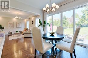 Newmarket (Glenway Estates) apartment for rent - A well-lit dining room with a table set for two.