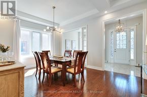 Newmarket (Glenway Estates) apartment for rent - A dining room with a wooden table and chairs.