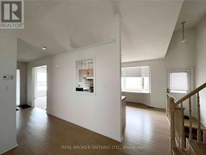 Niagara Falls (West Wood) apartment for rent - A real estate broker's office with a white interior.