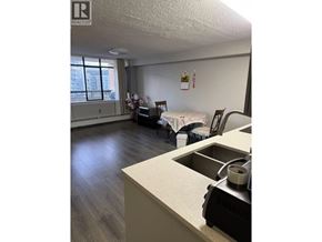 Richmond apartment for rent - A kitchen with a sink and a window.