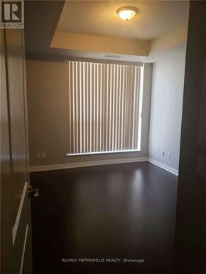 Markham (Wismer) condo for rent - A room with a window covered with blinds.