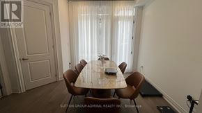 Richmond Hill (Oak Ridges) townhouse for rent - A dining room with a table set for six.