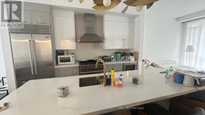 Richmond Hill (Oak Ridges) townhouse for rent - A kitchen with a white countertop and stainless steel appliances.
