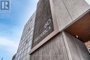 Kitchener condo for rent - A building with a sign that says 60 Frederick.