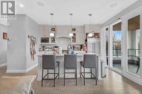 Ottawa apartment for rent - A kitchen with a table and chairs in front of it.