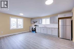 Windsor apartment for rent - A kitchen with a refrigerator, dishwasher, and oven.
