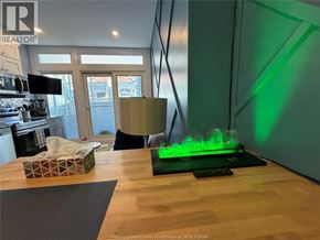 Windsor condo for rent - A kitchen with a green light on the counter.