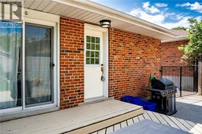 Burlington apartment for rent - A house with a white door and a sign that says REALTOR.