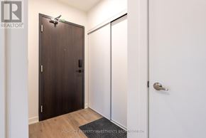 Barrie (Little Lake) condo for rent - A room with a brown door and a white door.