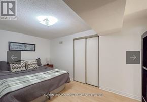 Vaughan (Lakeview Estates) apartment for rent - A bedroom with a bed, pillows, and a picture on the wall.