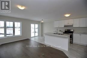 Haldimand townhouse for rent - A real estate office is showing a kitchen area in a new property.