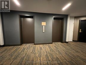 Toronto (Englemount-Lawrence) condo for rent - A white washing machine and dryer in a small laundry room.