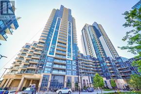 Toronto (Woburn) condo for rent - Two tall buildings with blue glass windows are in the foreground.