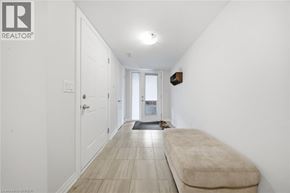 Brantford townhouse for rent - A long hallway with a bench at the end.