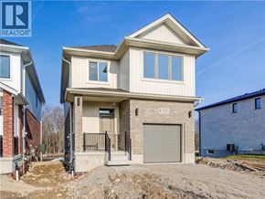 Cambridge apartment for rent - A two-story house with a garage is under construction.