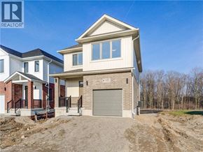 Cambridge apartment for rent - A two-story house with a garage is for sale.