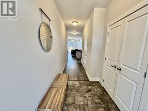 Blue Mountains apartment for rent - A hallway with a mirror and a bench.