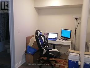 Markham (Commerce Valley) condo for rent - A room with a computer desk and a gaming chair.