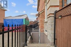 Toronto (Downsview-Roding-Cfb) apartment for rent - A blue tarp is covering a building in the background.