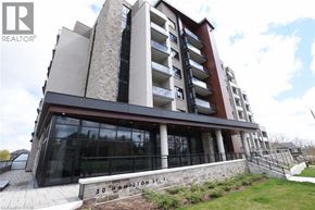 Waterdown condo for rent - A modern building with the number 30 on it.