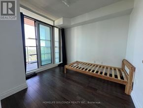 Toronto (Bendale) condo for rent - A bedroom with a bed and a window.