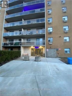 London South (South M) condo for rent - A building with a blue light on the front.