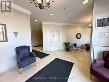 Mississauga (Central Erin Mills) condo for rent - A living room with a blue chair and a purple chair.