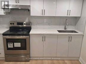 Toronto (Milliken) apartment for rent - A kitchen with a stove and sink.