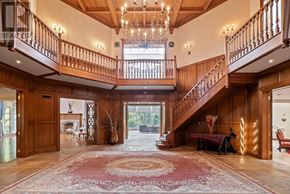 Caledon apartment for rent - A large, open foyer with a staircase and a chandelier.
