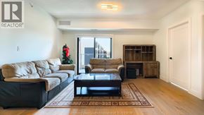 Lasalle condo for rent - A living room with a Christmas tree and a couch.