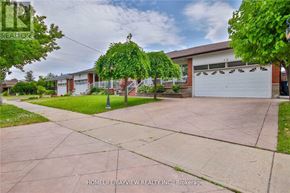 Toronto (York University Heights) apartment for rent - A residential area with a house and a garage.