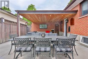 Toronto (York University Heights) apartment for rent - A patio with a table and chairs is shown.