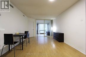 Toronto (Bay Street Corridor) condo for rent - A dining room with a table and chairs is shown.