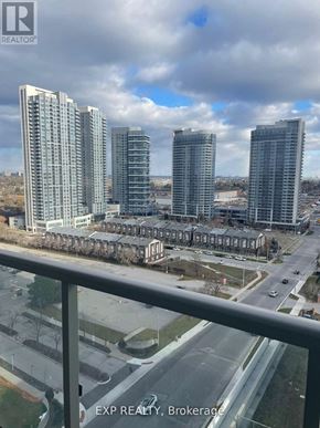 Toronto (Agincourt South-Malvern West) condo for rent - A view of a cityscape from a balcony with the text "EXP REALTY, Brokerage" visible on the railing.